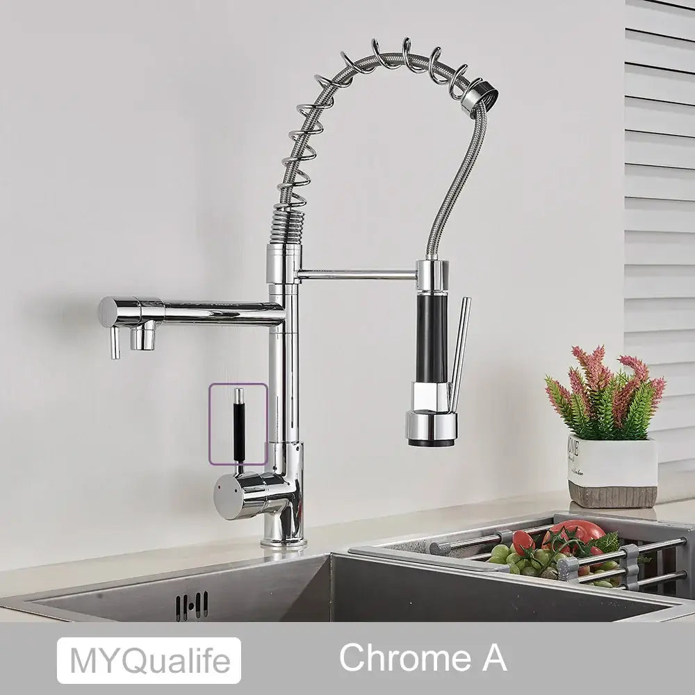 Chrome finished decorbites black brass kitchen faucet with flexible coiled hose and black accents on pull down spray head
