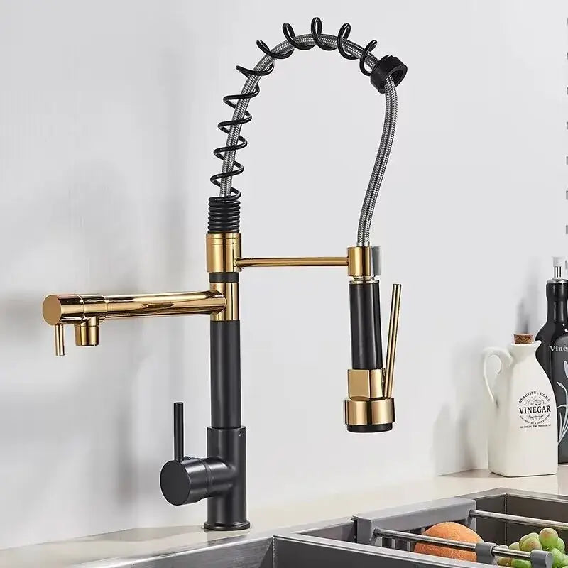 Modern decorbites black brass kitchen faucet with two-tone black and gold finish featuring flexible dual spout and pull-down spray
