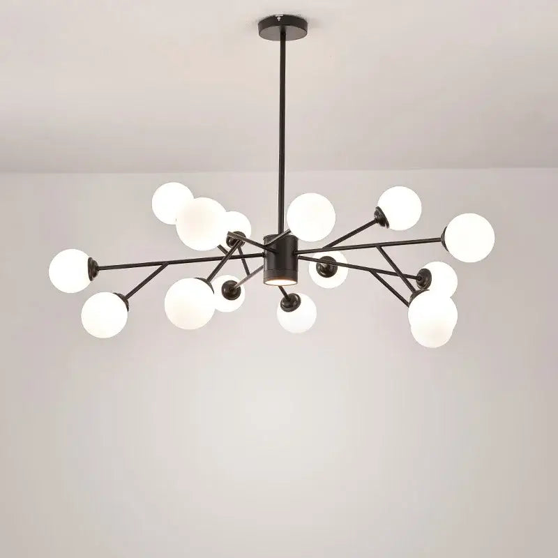 Modern black chandelier by Decorbites with frosted white glass globe bulbs for elegant living room lighting