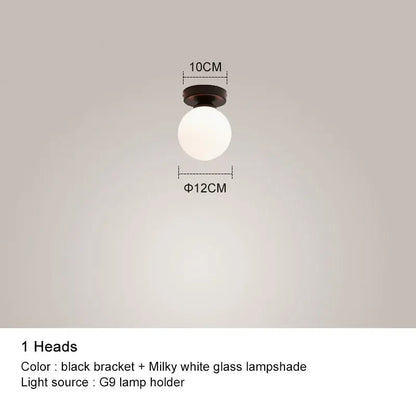 Decorbites black chandelier featuring a black bracket with milky white glass lampshade for living room use