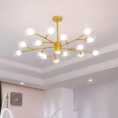Gold-toned DecorBites black glass ball molecule chandelier with clear glass globe bulbs in nordic luxury design
