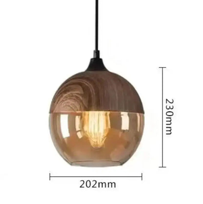 DecorBites™ black glass pendant light fixture with amber spherical shade and wood-grain texture for modern indoor decor