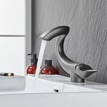 Modern matte black decorbites black gold brass bathroom faucet with sculpted design and curved spout deck mounted chrome gray