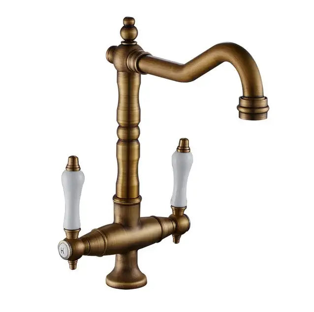 Antique brass kitchen sink faucet with white ceramic handles and ornate design from DecorBites™ black gold brass series