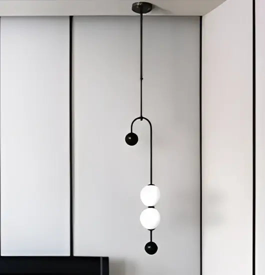 Decorbites black gold chandelier pendant featuring black metal frame with three white spherical glass globes in nordic style