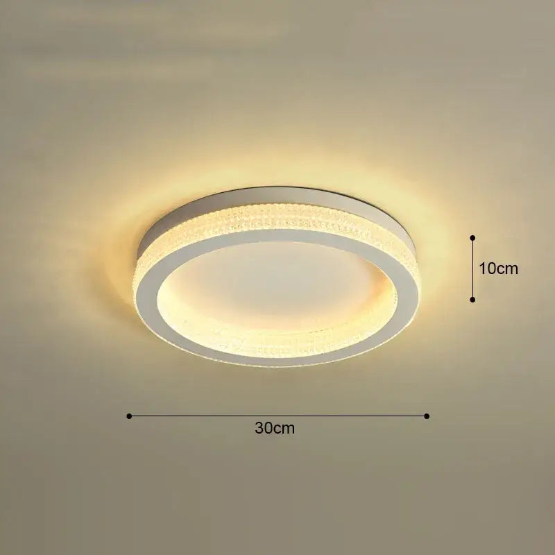 Modern decorbites black gold crystal chandelier ceiling light with sleek white frame and warm glowing LED ring for living room