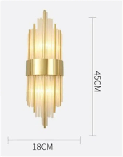 Gold-toned DecorBites black gold crystal wall lights with vertical glass rods and central metallic band for bedroom and living room