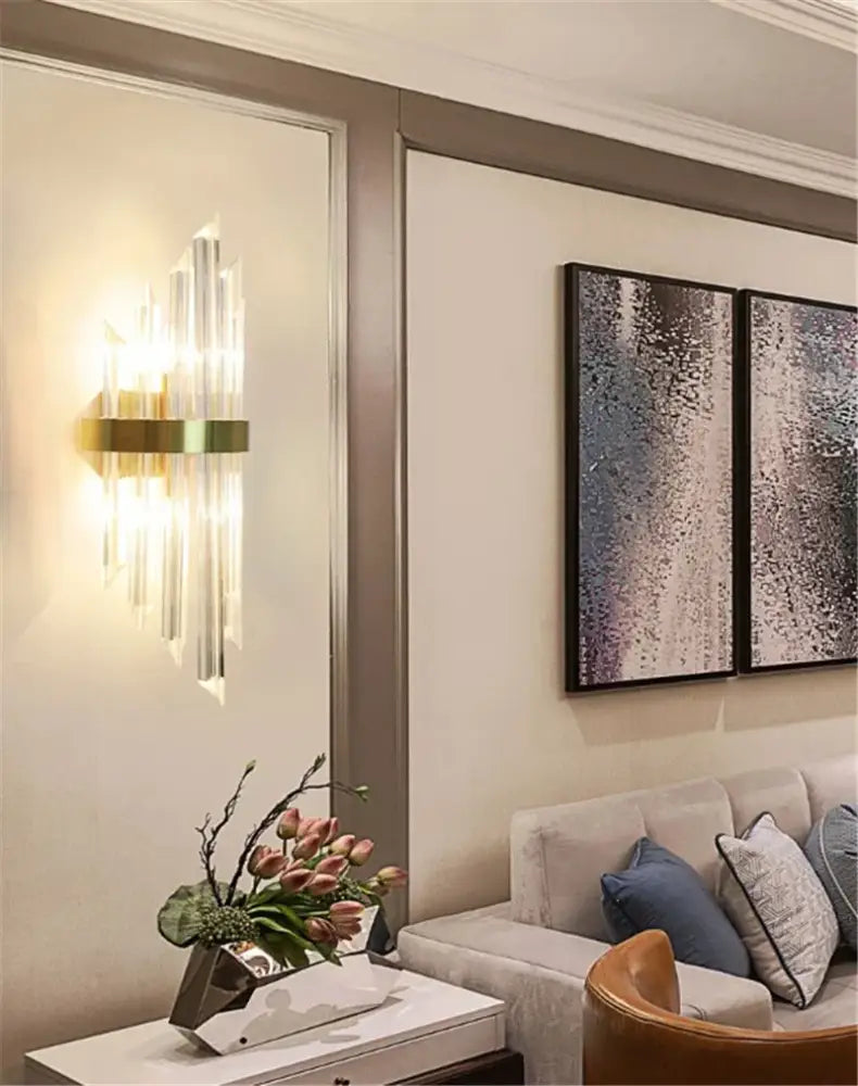 Gold-toned decorbites black gold crystal wall lights with vertical prisms casting warm light for bedroom and living room
