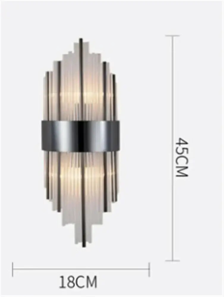 Modern decorbites black gold crystal wall light featuring frosted glass tubes and brushed metal for bedroom or living room