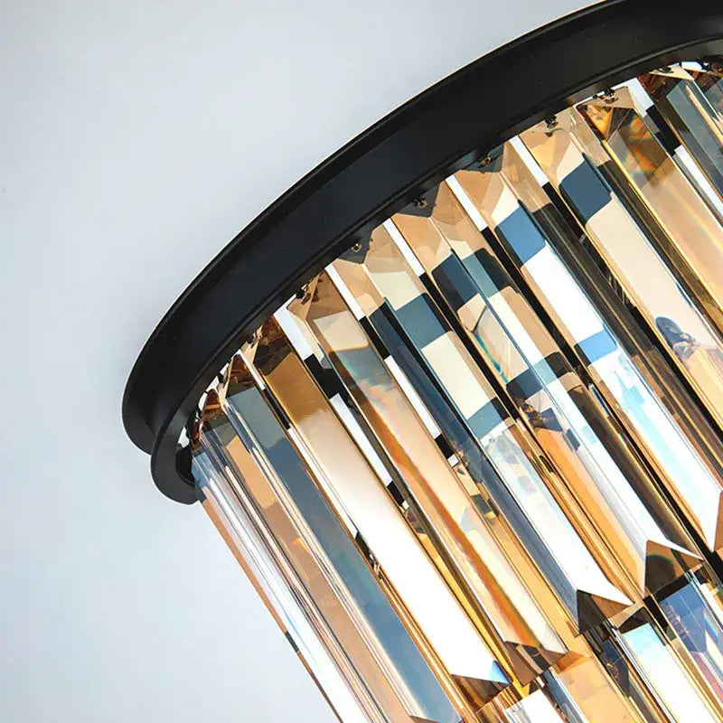 Decorbites™ black gold crystal wall sconce with sleek circular frame and cascading gold-toned crystal prisms for home décor