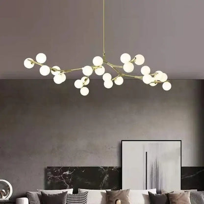 Modern gold-toned decorbites black gold led glass ball chandelier with frosted globes for living room and kitchen décor