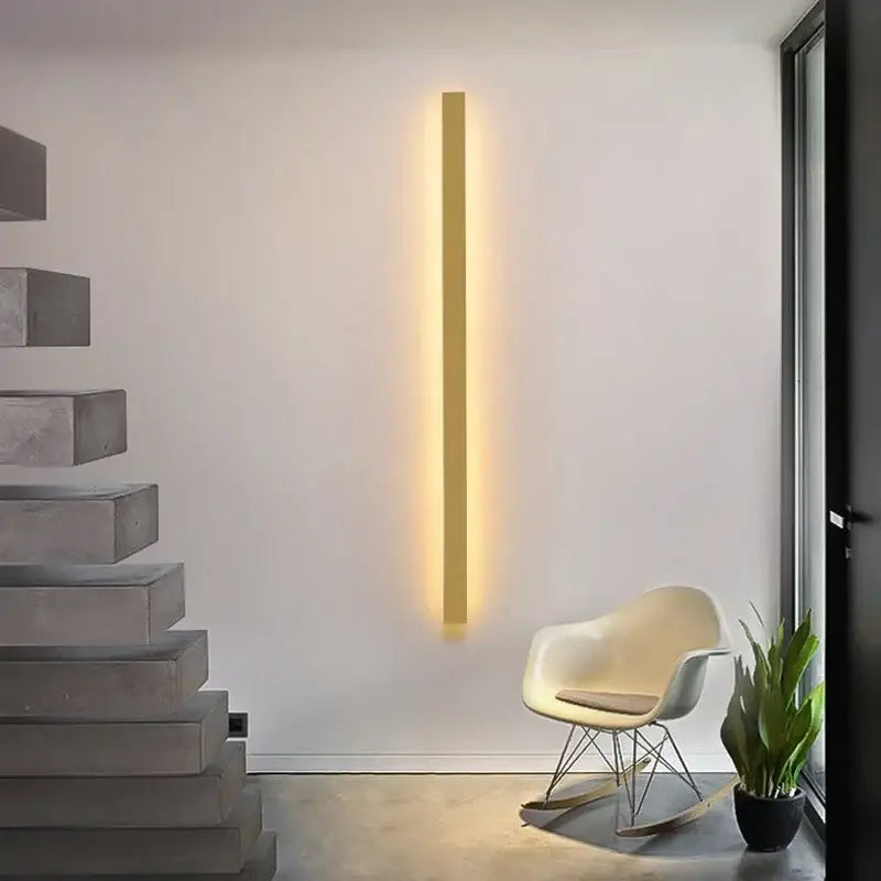 DecorBites black gold LED wall lights with sleek minimalist design and warm yellow glow for dining and living rooms