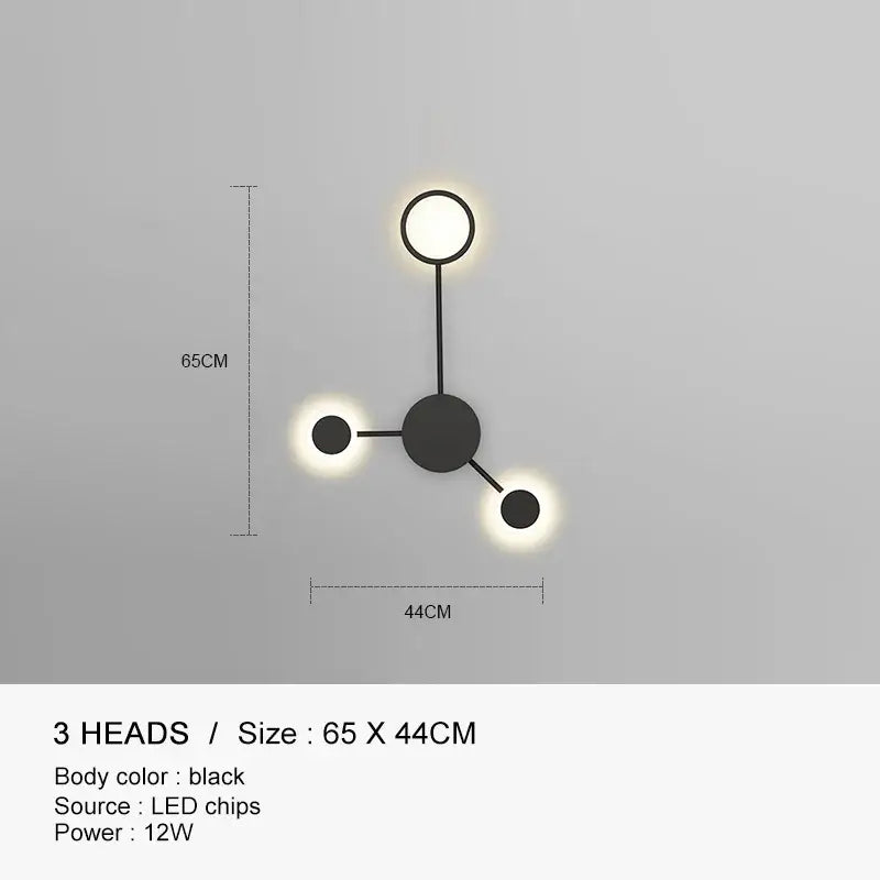 Black modern wall lamp by DecorBites black gold with three circular led light heads in a molecular design for indoor use