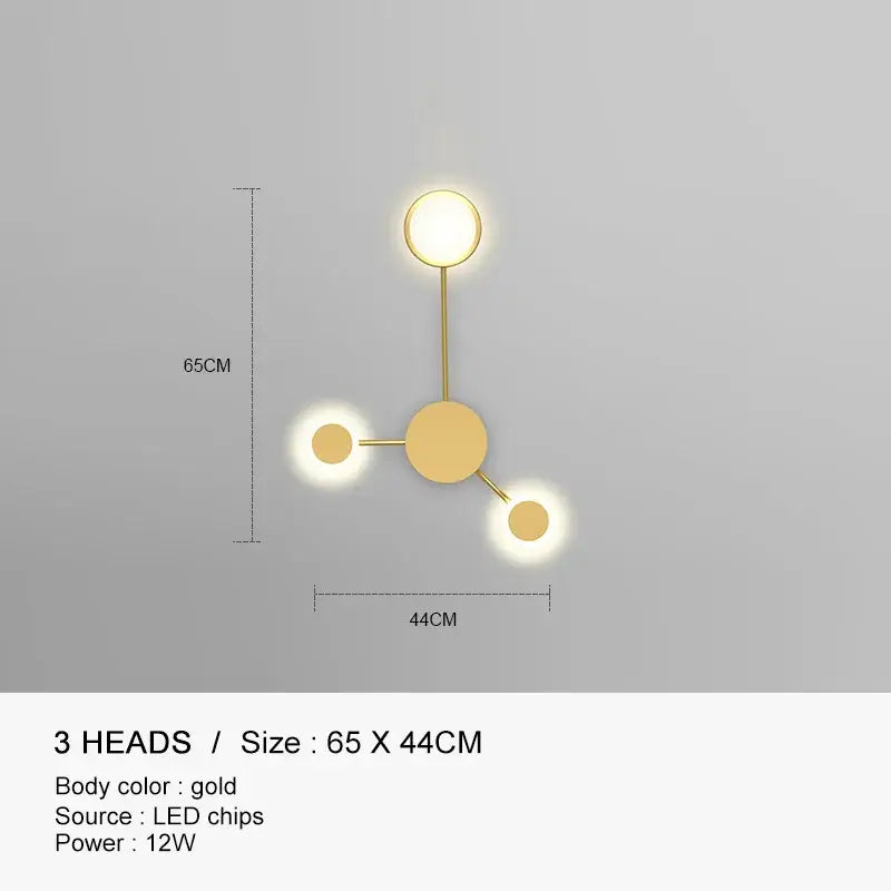 Gold-colored DecorBites black gold LED wall lamp with three circular lights in molecular design for indoor use