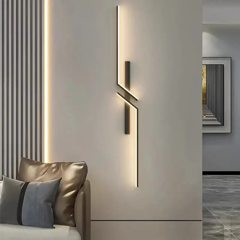 Modern minimalist DecorBites Black Gold LED wall lights with sleek black metal arms and warm lighting for bedroom stairs