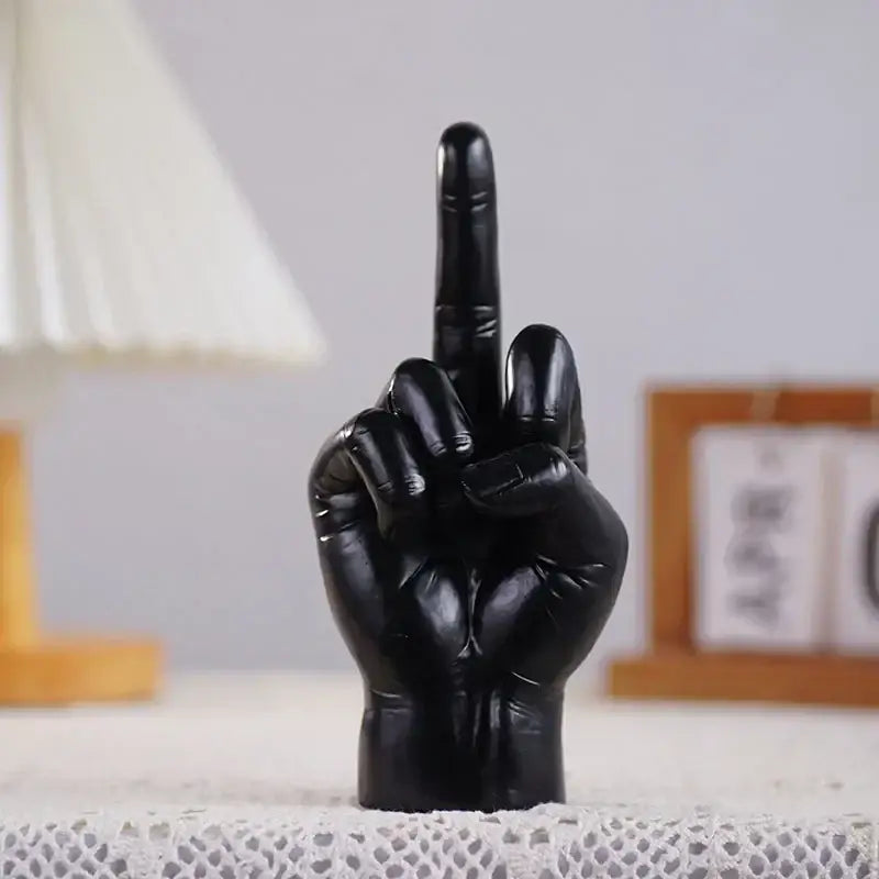 Decorbites black gold glossy resin hand sculpture featuring gold middle finger gesture for modern home decor