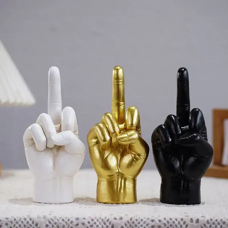 Three glossy resin hand sculptures in matte white metallic gold and high gloss black for decorbites black gold middle finger decor