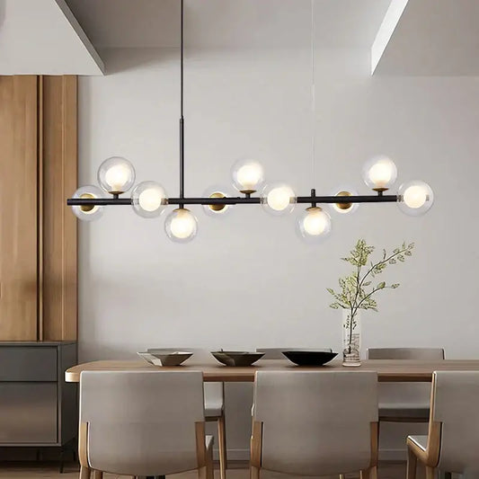 Modern black metal DecorBites black gold nordic pendant chandelier with clear glass globe bulbs for dining and living rooms