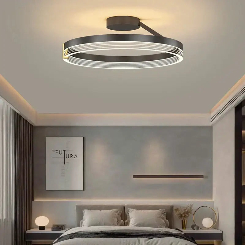 Modern black gold round chandelier with concentric rings and minimalist design by DecorBites black gold for home decoration