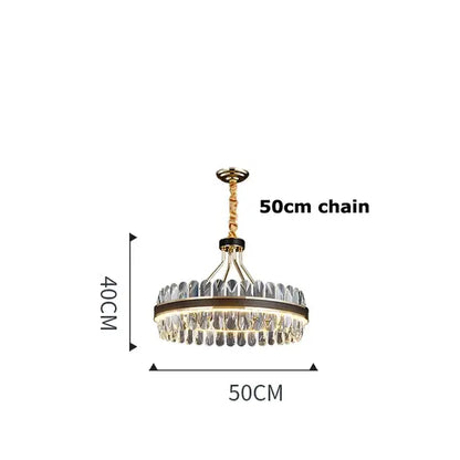 A modern decorbites black gold round led crystal chandelier with gold-toned frame and clear faceted crystals suspended by a 50cm chain