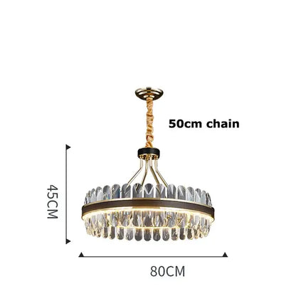 A decorbites black gold round led crystal chandelier with gold-toned frame and clear crystals for living room lighting