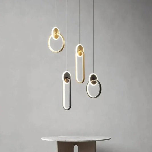 Modern minimalist decorbites black gold pendant light with sleek black gold round illuminated edges for bedside use