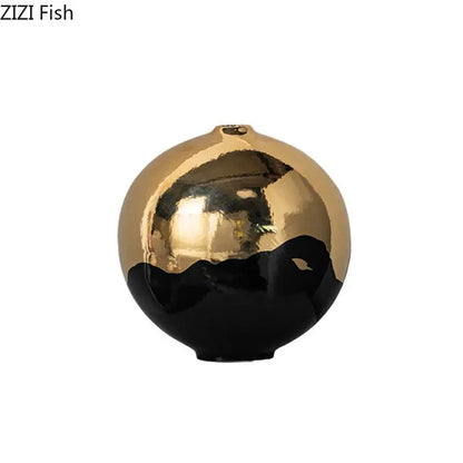 A sleek decorbites black golden ceramic vase with glossy gold upper half and smooth black lower half for room decor