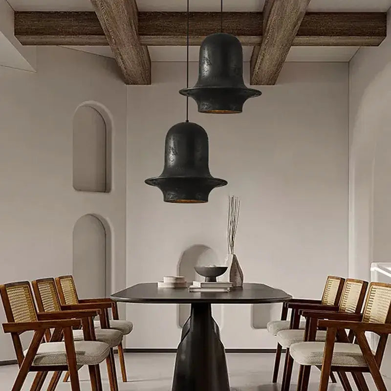 Two matte black bell-shaped pendant lights from decorbites black industrial chandelier for cafe and bar decor