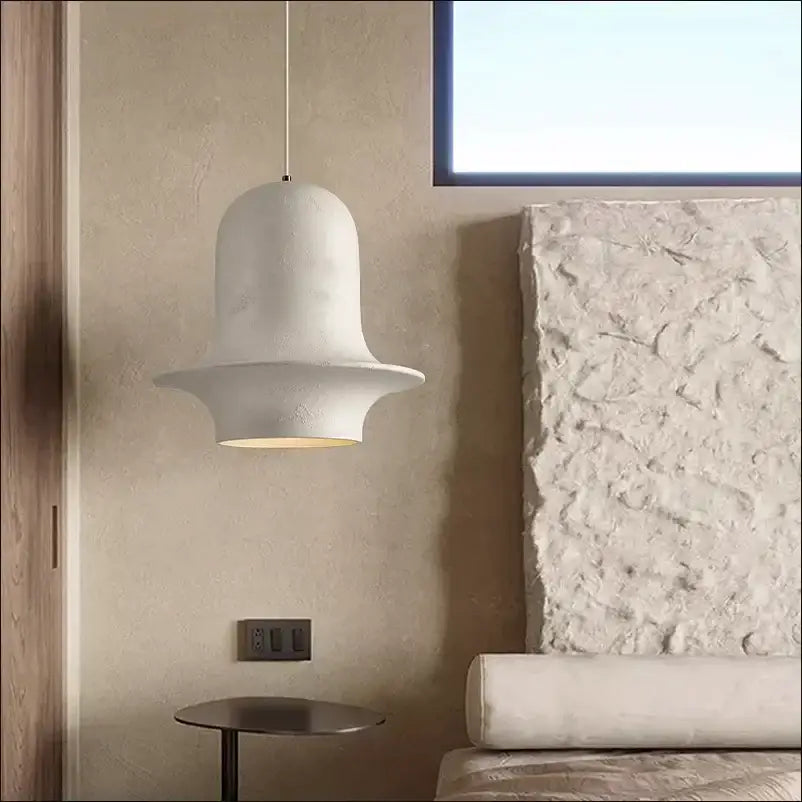 A white textured bell-shaped pendant light from decorbites black industrial chandelier for cafe and bedroom decor