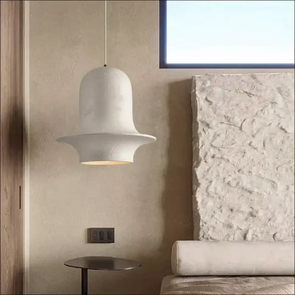 A white textured bell-shaped pendant light from decorbites black industrial chandelier for cafe and bedroom decor