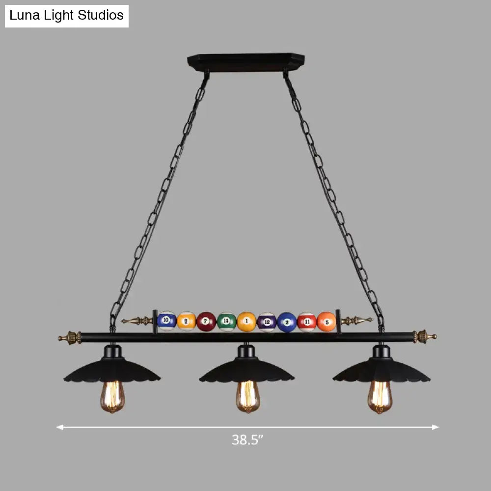 Black wrought iron pool table light fixture with 3-light suspension lamp and colorful billiard balls on central bar