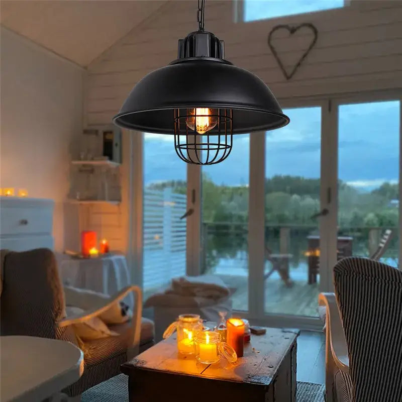 Decorbites black industrial pendant light with metal cage and exposed bulb for kitchen island and farmhouse decor