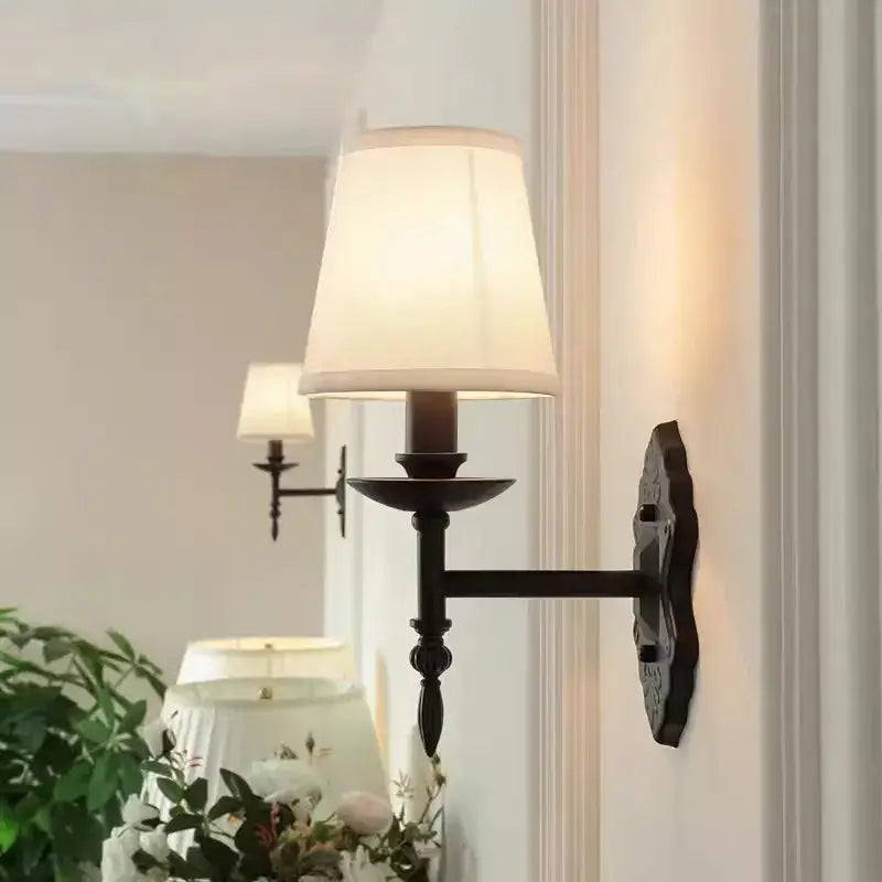 Dark bronze-finished decorbites black iron wall lamp with cream fabric shade for european bedroom and living room sconce