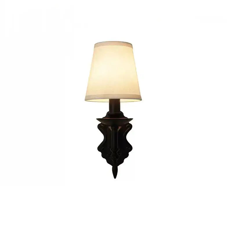 Dark bronze ornate decorbites black iron wall lamp with cream fabric shade for retro bedroom or living room decor