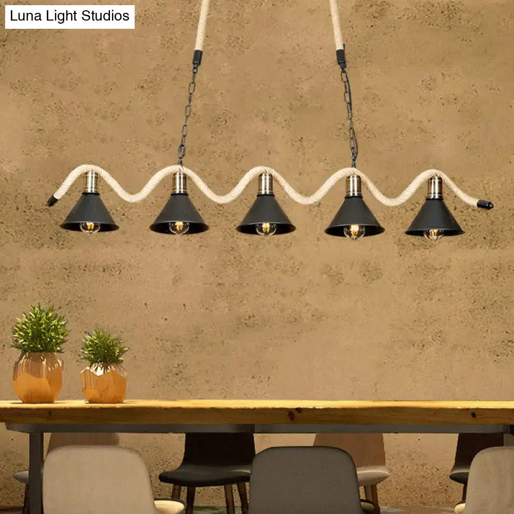 DecorBites black island pendant with five black metal shade lights suspended by hemp rope and metal chains