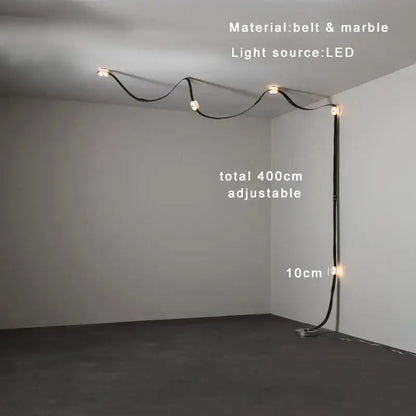 A sleek decorbites black leather marble chandelier with adjustable curved design extending 400cm for dining rooms