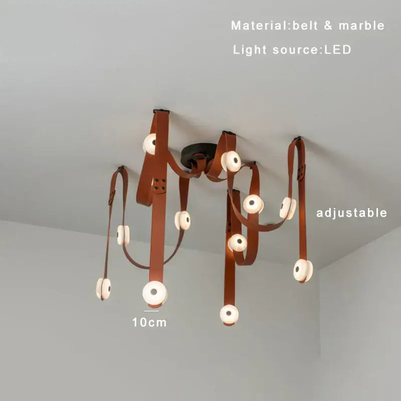 A decorbites black leather marble chandelier with adjustable arms and circular led lights for dining room decor