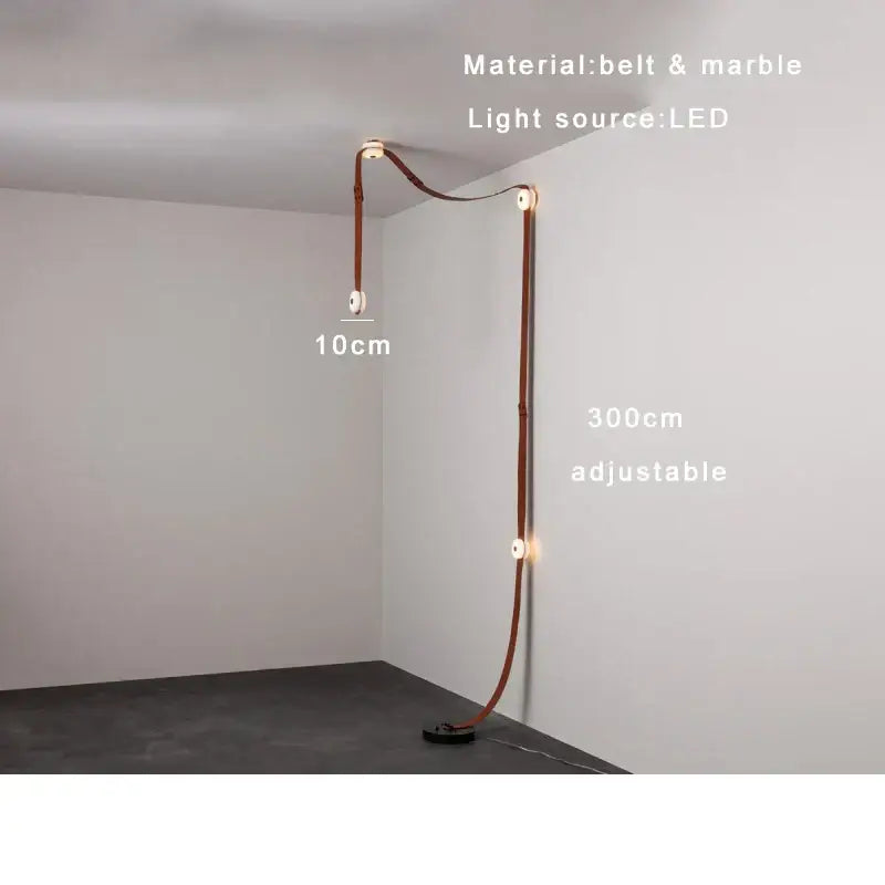A sleek DecorBites black leather marble adjustable floor lamp with curved leather belt and marble accents for dining rooms