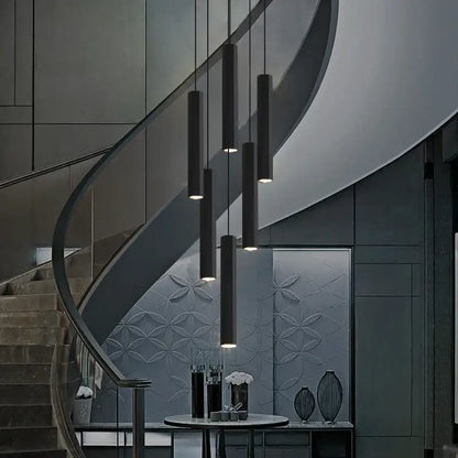 Modern decorbites black led crystal staircase chandelier with black cylindrical pendant lights in a sleek minimalist design
