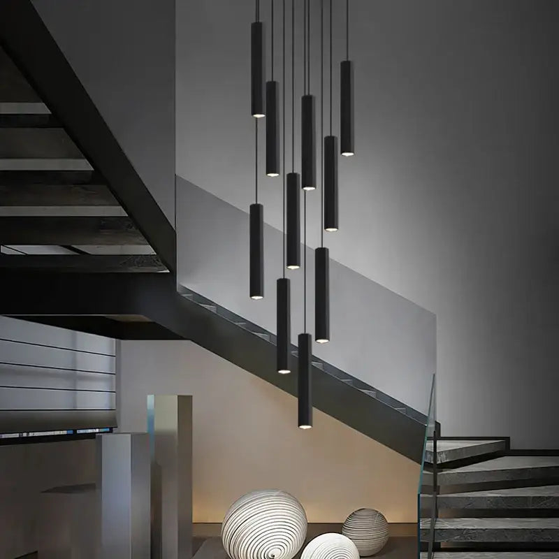 Modern nordic decorbites black led crystal staircase chandelier with black cylindrical pendant lights emitting soft glow