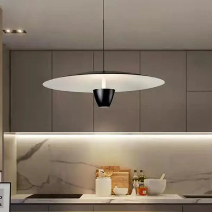 Modern black and white pendant light with sleek disc-shaped design by DecorBites black led hanging for restaurant use