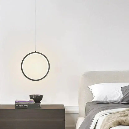 Minimalist DecorBites black LED pendant light with sleek black frame and soft diffused glow for elegant bedroom use