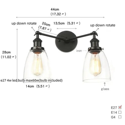 Black iron wall sconce with two adjustable arms and clear glass shades featuring exposed edison bulbs from decorbites black led wall collection