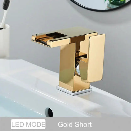 Gold-colored decorbites black led waterfall bathroom faucet with sleek rectangular design and polished metallic finish