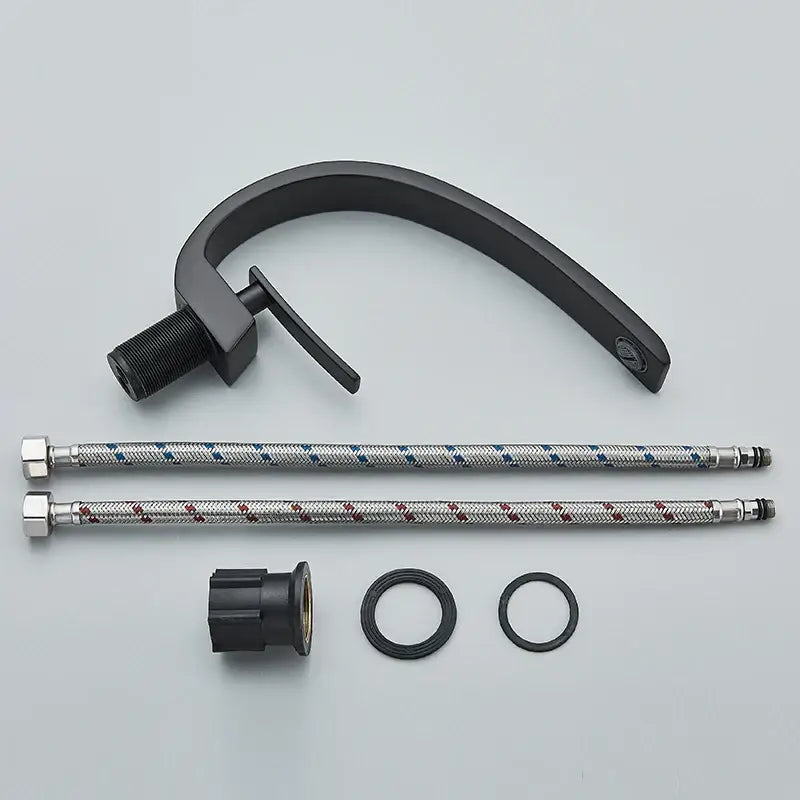 DecorBites™ black luxury brass basin faucet mixer tap with curved spout, integrated handle, and braided metal hoses