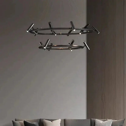 Modern black metal chandelier by Decorbites with two concentric rings and angular LED light fixtures for dining rooms