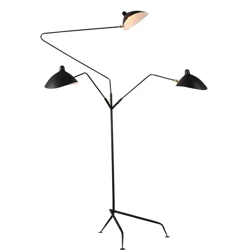 Black nordic floor lamp by decorbites with three adjustable metal arms and cone-shaped shades for living room use