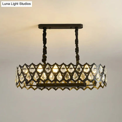 A vintage-inspired dark bronze island pendant with intricate lattice and clear crystal teardrops for 220v-240v use