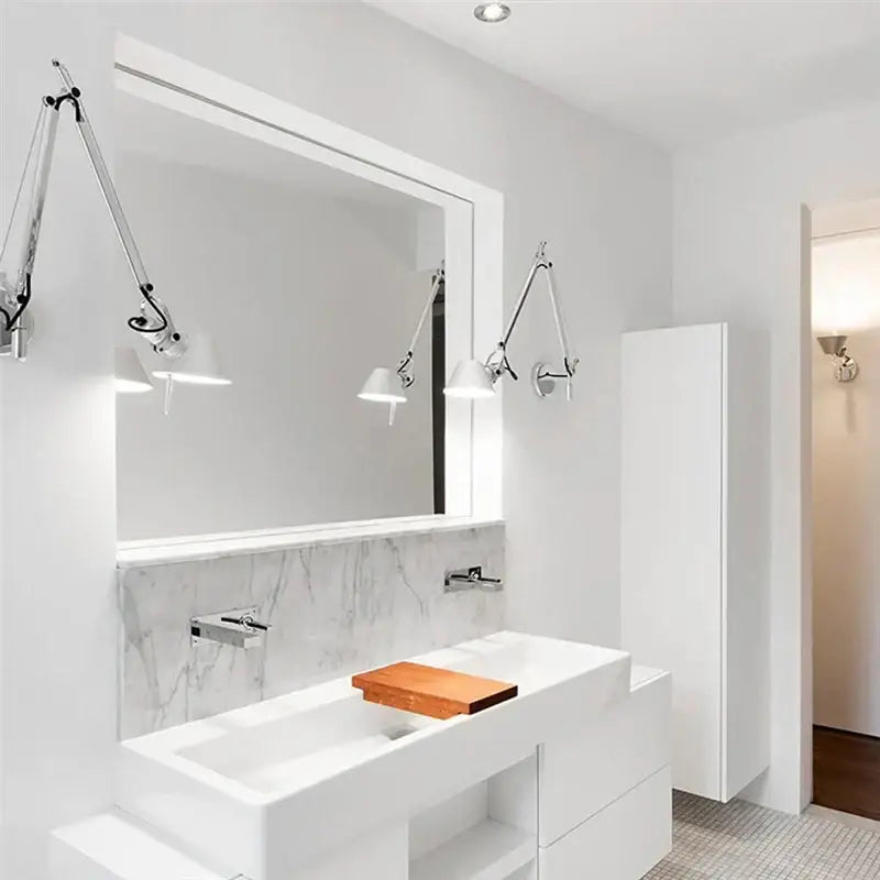White rectangular sink with minimalist design and chrome faucet on marble backsplash complement decorbites black silver rotatable wall light for study office