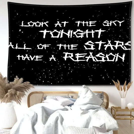 Decorbites black sky art tapestry featuring white distressed lettering on a black starry wall tapestry for bedroom decor